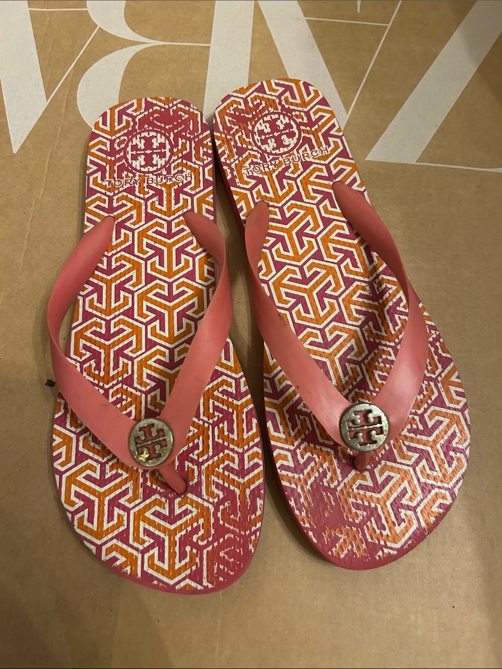 Tory Burch Coral and Orange Geometric Logo Flip Flops
